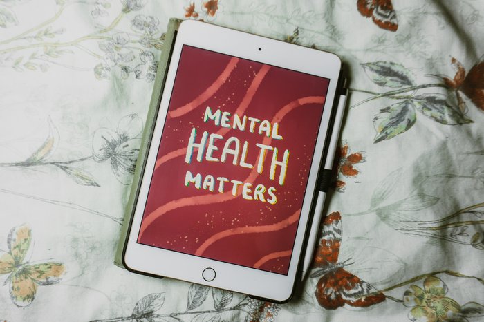 Tablet displaying 'Mental Health Matters'